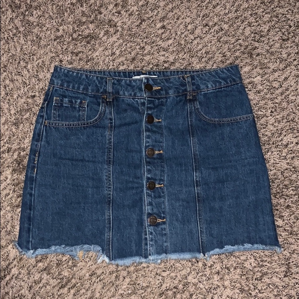 Distressed denim mini skirt